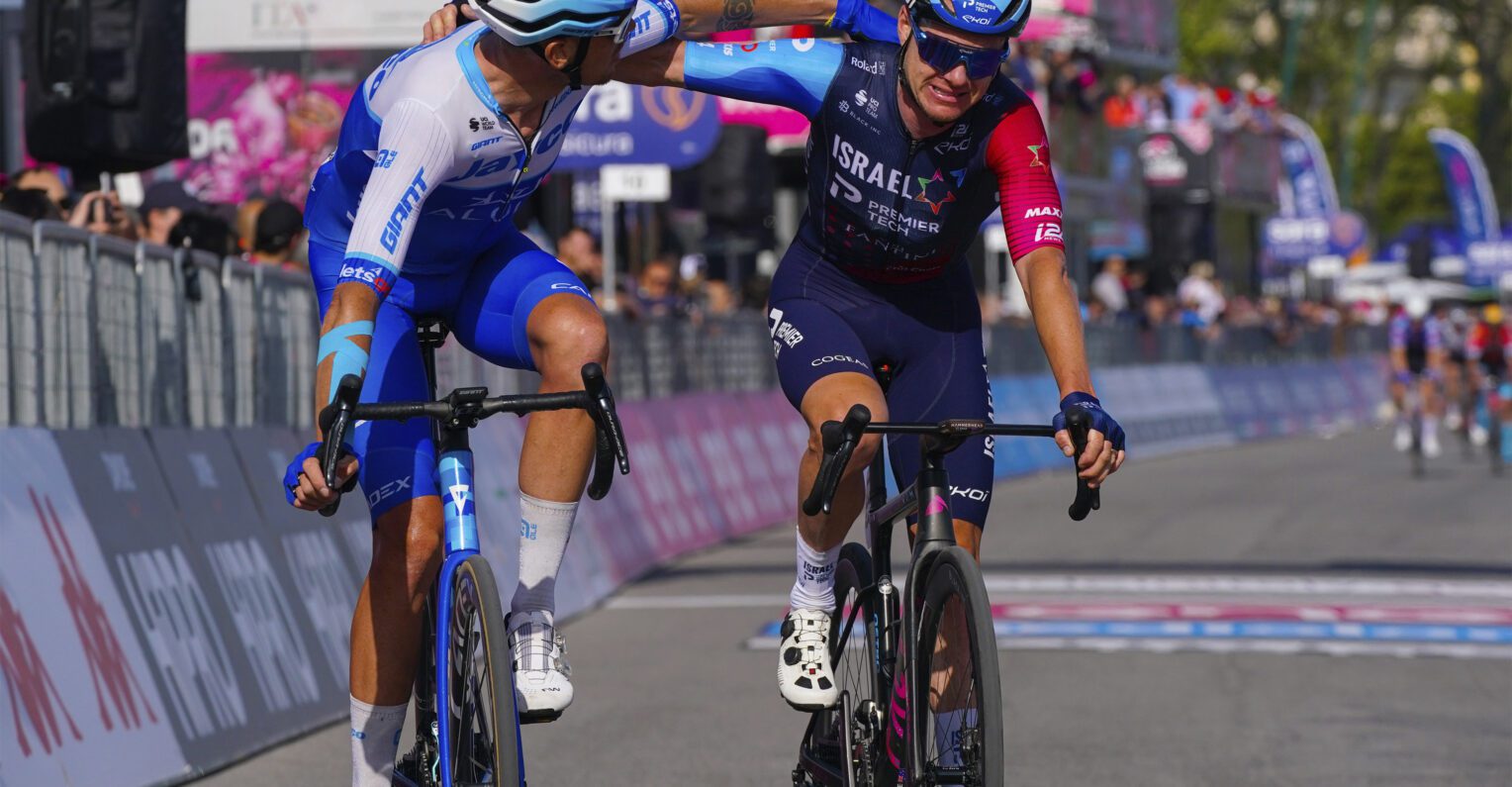 Simon Clarke and Alessandro De Marchi console each other after their day-long breakaway on stage six of the Giro d'Italia 2023