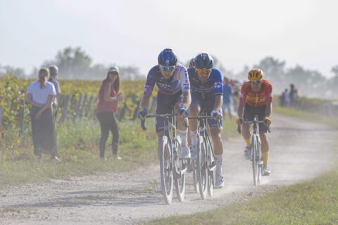 Riley Sheehan drives on the lead group during Paris - Tours 2023