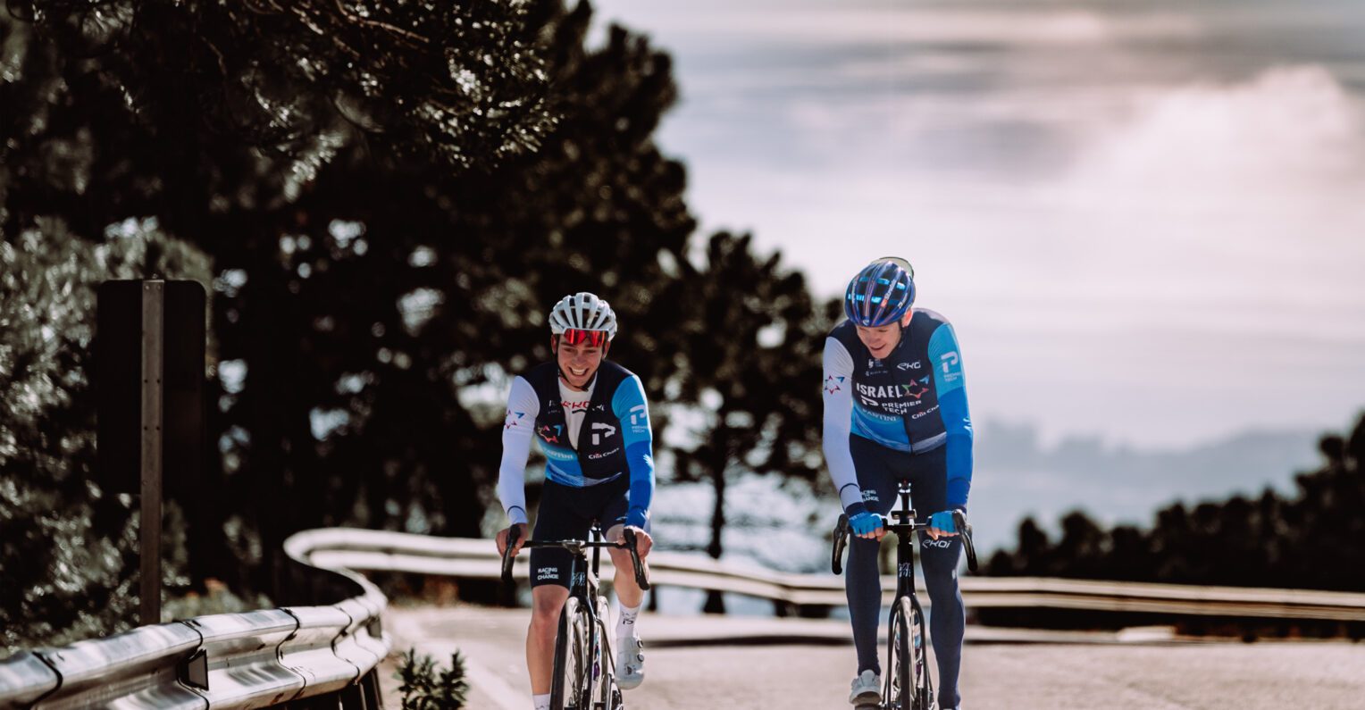Mason Hollyman and Chris Froome riding together during IPT's Marbella training camp